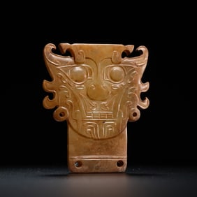 Jade pendant with divine face, 20th century BC