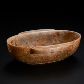 A Hetian jade cup with animal patterns from the Han Dynasty, AD 100-200