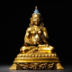 A Tibetan Gilt-Bronze Seated Buddha Figure, 17th Century