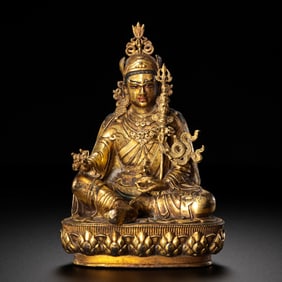 A gilt-bronze figure of Padmasambhava, Tibet, 17th century