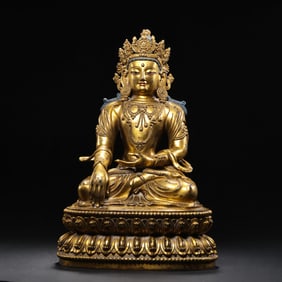 A Ming Yongle Gilded Bronze Statue of Seated Guanyin