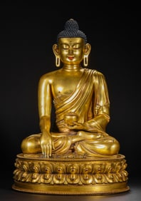 A gilt-bronze figure of a seated Buddha from the 17th and 18th centuries
