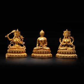 set of three gilt-bronze figures of seated Buddha from the 17th and 18th centuries