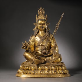 A gilt-bronze figure of Padmasambhava, Tibet, 17th century