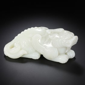 A 17th-18th century Hetian white jade unicorn
