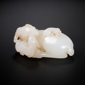 A 17th-18th century Hetian white jade “Three Yangs Bring Good Fortune?? hand-held piece