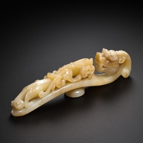 A 17th century Hetian white jade dragon head belt hook