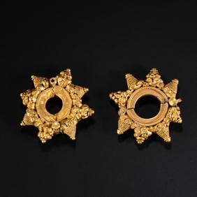 A PAIR OF ANCIENT PERSIAN GOLD EARRINGS DATING FROM 1000 AD OR EARLIER