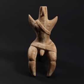 LIMESTONE STATUE OF A MALE DEITY FROM MESOPOTAMIA, CIRCA 2000 AD OR EARLIER