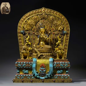 18. A CHINESE QING DYNASTY GILT BRONZE AND GEMSTONE SEATED STATUE OF TARA