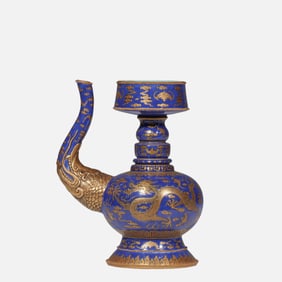 A CHINESE QING DYNASTY QIANLONG PERIOD BLUE GLAZE GILDED DRAGON PATTERNED BENBA TEAPOT