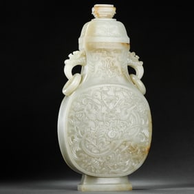 CHINESE QING DYNASTY WHITE JADE VASE WITH DOUBLE RING HANDLES AND DRAGON PATTERN