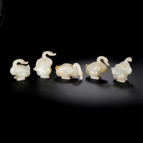 A GROUP OF HETIAN JADE GEESE FROM THE QING DYNASTY, CHINA
