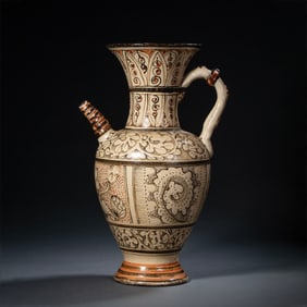 A CHINESE NORTHERN SONG DYNASTY CIZHOU KILN WHITE GROUND BLACK PATTERNED EWER