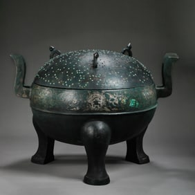 A TRIPOD WITH A LID AND INLAID GOLD AND SILVER FROM THE WARRING STATES PERIOD OF CHINA