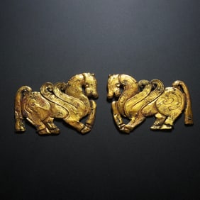 A PAIR OF PURE GOLD ORNAMENTS FROM THE HAN DYNASTY, CHINA