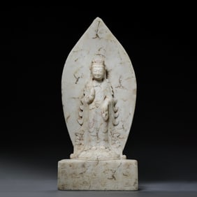 STANDING BUDDHA STATUE MADE OF WHITE JADE FROM THE TANG DYNASTY, CHINA