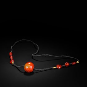 CHINESE WARRING STATES PERIOD RED AGATE NECKLACE