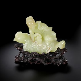 A CHINESE QING DYNASTY HETIAN YELLOW JADE FIGURE-CARVING ORNAMENT