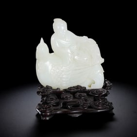 A CHINESE QING DYNASTY HETIAN WHITE JADE FIGURE-CARVING ORNAMENT