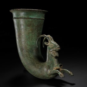 BRONZE SHEEP HEAD CUP FROM THE SHANG AND ZHOU DYNASTIES