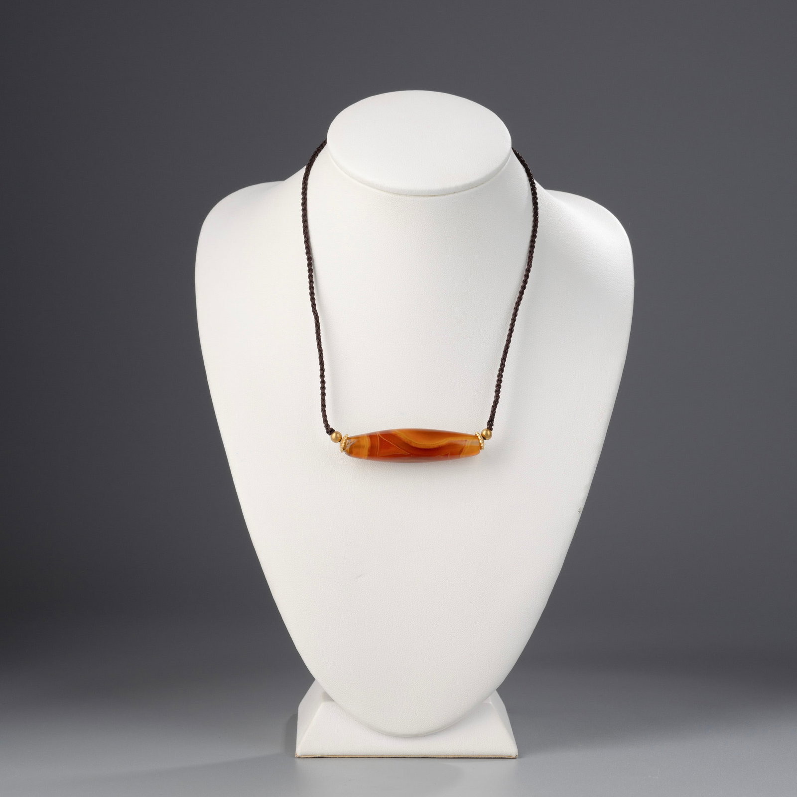 Near Eastern Agate Bead Necklace, Hand-Knotted Design with Soft Fabric: A beautifully handmade necklace featuring Near Eastern agate beads, knotted by hand using soft fabric for a gentle, elegant drape. The design highlights the natural beauty of the agate, with warm tone