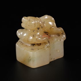 A white jade seal with a mythical beast-shaped knob from Hetian jade, dating from the 2nd to 3rd