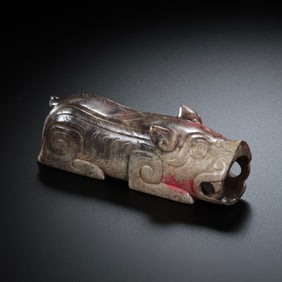 Jade pig-shaped artifact from the Han Dynasty, 1st-2nd century AD.