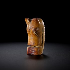 Jade dragon from the Liangzhu culture, Neolithic period, dating back 4000-5000 years.