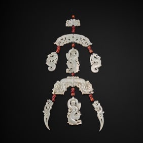 Jade pendants from the Warring States period in China, dating back to the 2nd century BC or later.