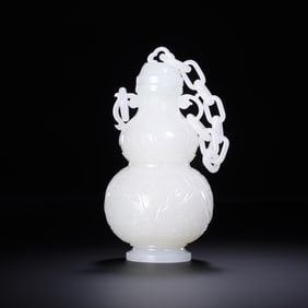 18th-century Chinese Qing Dynasty Hetian white jade gourd-shaped vase with relief carvings of