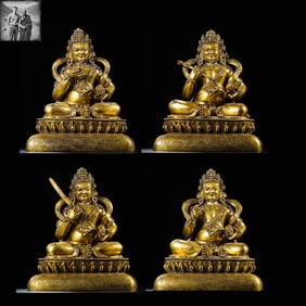 Seated statues of the Four Heavenly Kings in gilt bronze with engraved inscriptions from the
