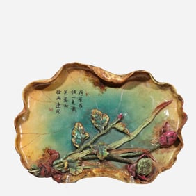 An 18th-century Chinese Qing Dynasty biomorphic porcelain ornament bearing the six-character mark