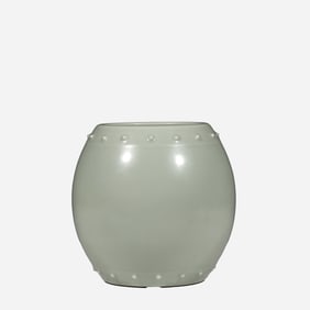 An 18th-century celadon drum-shaped jar from the Qing Dynasty of China bears the six-character mark