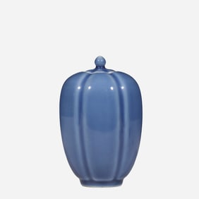 A 17th-century blue-glazed melon-shaped covered jar from the Qing Dynasty of China, bearing the
