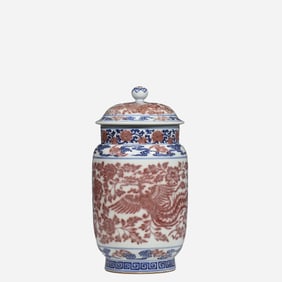 An 18th-century Chinese Qing Dynasty blue-and-white underglaze red phoenix-patterned jar bearing the