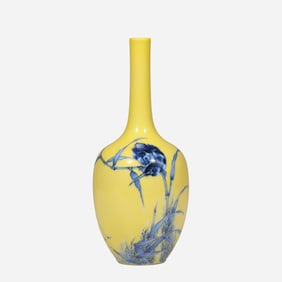 A yellow-ground blue-and-white porcelain vase with floral and bird design by 20th-century art master