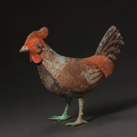 Painted bronze rooster from the Han Dynasty in China, dating from the 1st century BC or later.