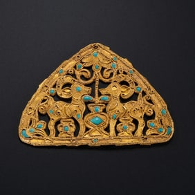 A pure gold hat ornament inlaid with turquoise from the Han Dynasty of China, dating from the 2nd