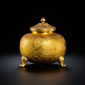 Gilded floral-patterned covered jar from the Tang Dynasty, 6th-7th century AD.