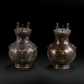 A pair of bronze vases inlaid with gold and silver from the Warring States period, dating from the