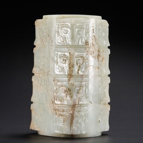 A four-layered jade cong with animal-face patterns from Hetian white jade, dating from the 1st to