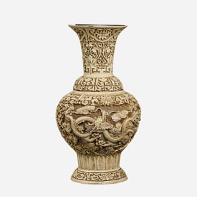 Ivory white carved red lacquer vase from the Qing Dynasty in China, 20th century or earlier