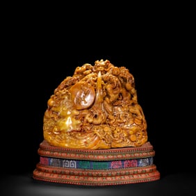 Nine Dragons Playing in the Sea, a Tianhuang stone carving from the Qing Dynasty, 18th century.