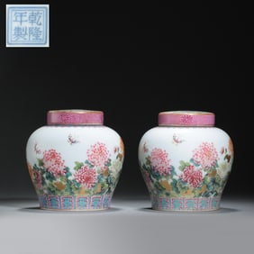 pair of 18th-century polychrome floral and bird pattern jars with four-character marks from the