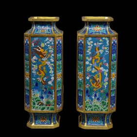 A pair of 18th-century cloisonné enamel vases with dragon designs from the Qianlong period of the