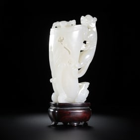 18th century, Chinese Qing Dynasty, Hetian white jade flower vase with antique-style dragon design.