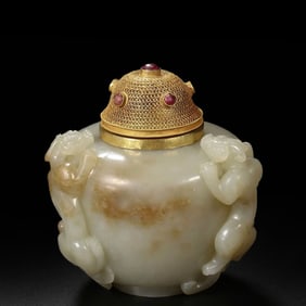 A 16th-17th century Ming Dynasty Hetian jade jar with pure gold filigree and gemstone inlay,