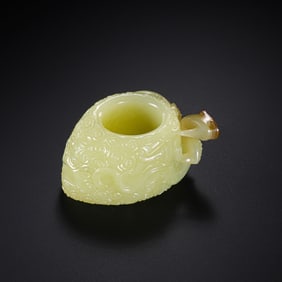 17th century, Ming Dynasty, China, yellow jade thumb ring with double dragon design