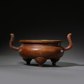 bronze incense burner with crown-shaped handles bearing the Xuande mark from the Qing Dynasty (18th